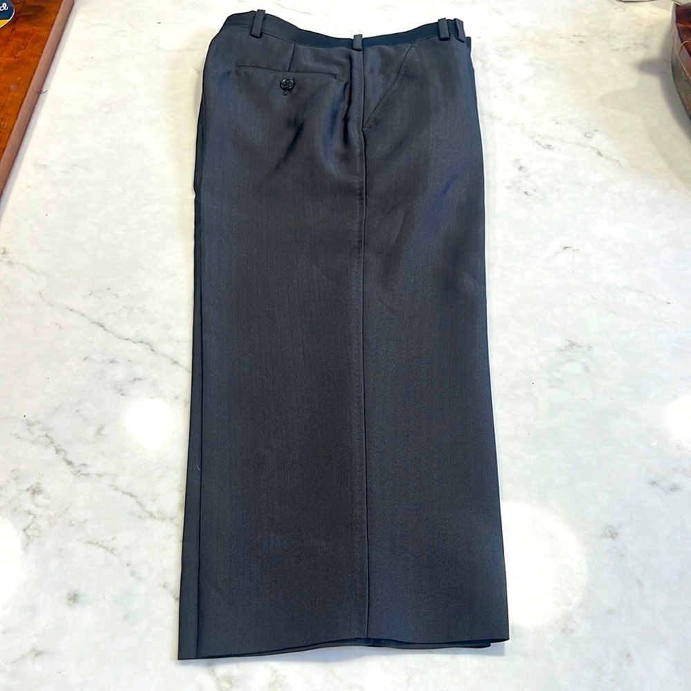 DKNY boys dark grey slacks. Has a bright that sheen that dresses them up.